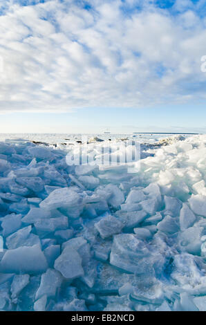 Pile of broken ice floes on the Baltic Sea coast Stock Photo