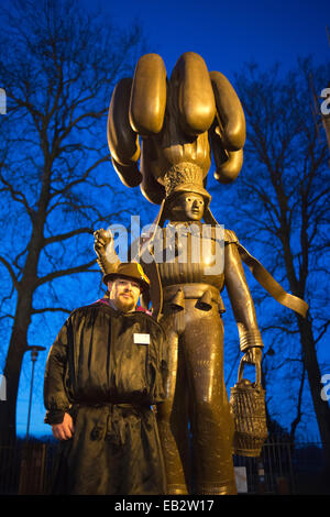 Unusual statue in the grounds of the Collegiate church Saint Ursmer, Binche, Hainaut, Wallonia, Belgium. The carnival of Binche Stock Photo