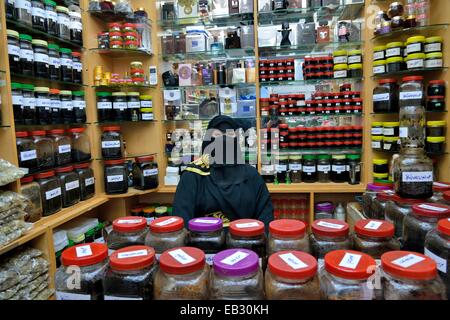 Incense seller at her booth on the incense market, Salalah, Dhofar Region, Orient, Oman Stock Photo