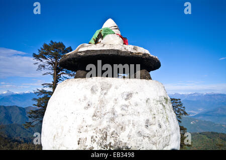 A large stone incense urn on a mountain pass in the Himalaya. Stock Photo