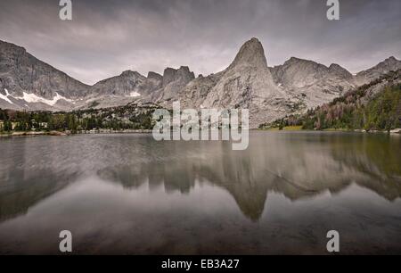 USA, Wyoming, Rocky Mountains, Wind River Range, Cirque of the Towers reflecting in Lonesome Lake Stock Photo