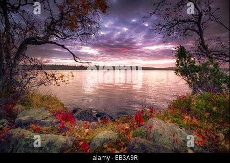 View of lake at dusk Stock Photo