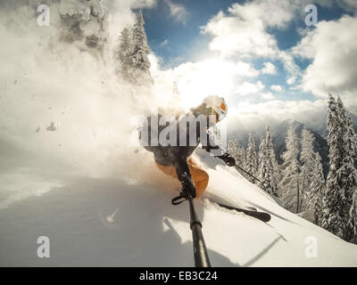 Austria, Salzburg, Zauchnsee, Person skiing in mountains Stock Photo