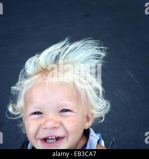 Portrait of happy toddler smiling Stock Photo