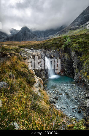 UK, Scotland, Fairy Pools waterfall on misty day Stock Photo