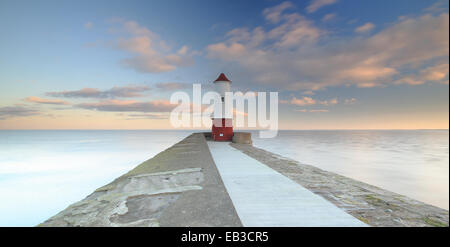 UK, England, North East England, Northumberland, Berwick Upon Tweed, View along footpath leading to lighthouse at end of pier Stock Photo