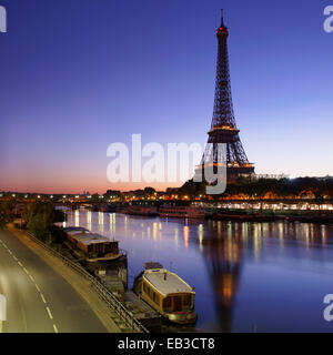 France, Paris, Eiffel Tower seen from across Seine River at sunrise Stock Photo