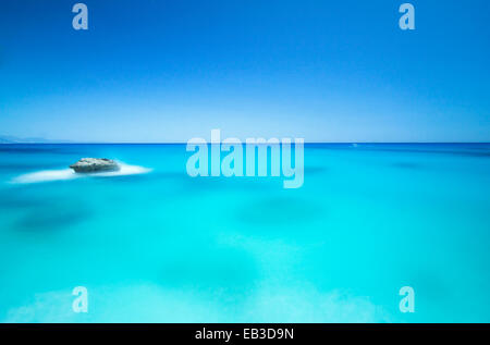 Italy, Sardinia, Motor boat in blue sea Stock Photo