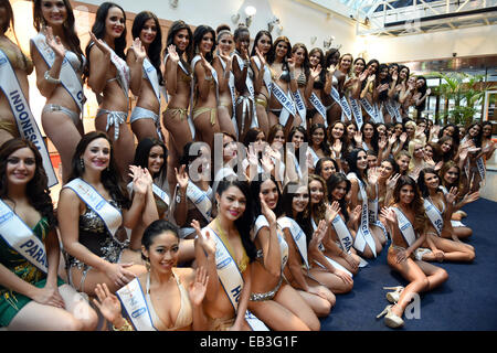 Berlin, Germany. 25th Nov, 2014. 70 beauty queens from 70 countries pose at a photo shoot for the Miss Intercontinental Contest at the hotel Holiday Inn Berlin City West in Berlin, Germany, 25 November 2014. The finale takes places in Magdeburg on 04 December 2014. Photo: JENS KALAENE/dpa/Alamy Live News Stock Photo