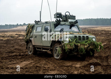 Husky is a new protected support vehicle, providing commanders with a highly mobile and flexible load carrying vehicle. This has Stock Photo