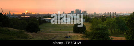 The City, Canary Wharf, O2 and Greenwich Park from the Greenwich Observatory at Sunset Stock Photo