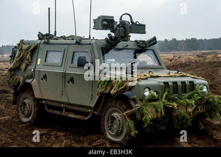 Husky is a new protected support vehicle, providing commanders with a highly mobile and flexible load carrying vehicle. This has Stock Photo