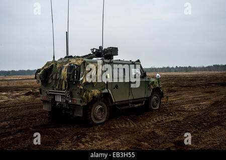 Husky is a new protected support vehicle, providing commanders with a highly mobile and flexible load carrying vehicle. This has Stock Photo