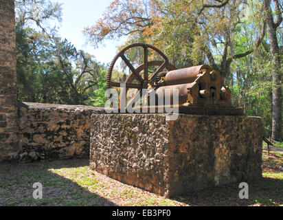 Roller mill formerly used to crush sugar cane. Yulee Sugar Mill Ruins Historic State Park in Old Homosassa, Florida. Stock Photo