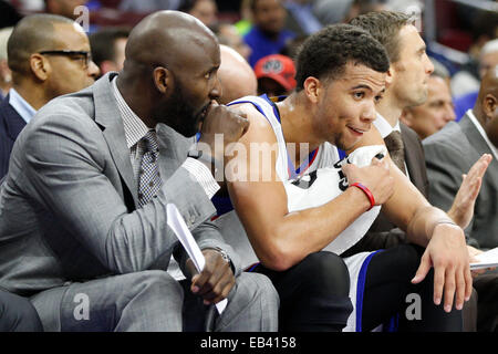 November 24, 2014: Philadelphia 76ers guard Michael Carter-Williams (1) looks on with assistant coach Lloyd Pierce during the NBA game between the Portland Trail Blazers and the Philadelphia 76ers at the Wells Fargo Center in Philadelphia, Pennsylvania. The Portland Trail Blazers won 114-104. Stock Photo