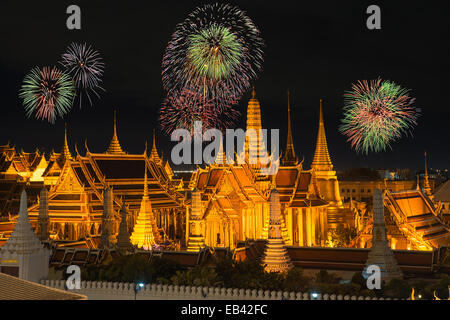 Grand palace and Wat phra keaw in night with new year fireworks Stock Photo