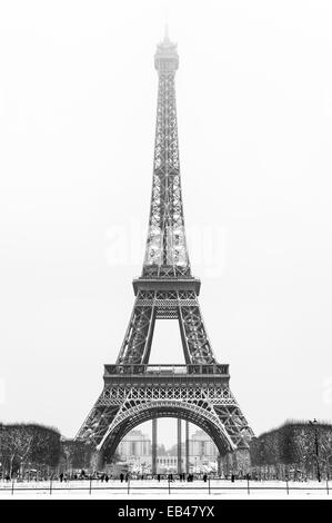 Eiffel tower under the snow in winter in black and white Stock Photo