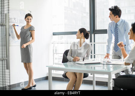 Young business people talking in meeting Stock Photo
