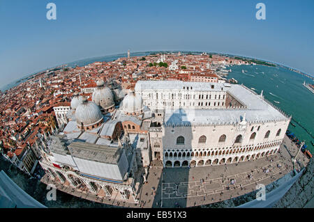 Fish eye lens view looking east from St Marks Bell Tower Venice Italy showing Basilica di San Marco Doges Palace Il Bacino sea Stock Photo
