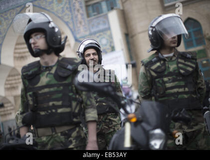 Tehran, Iran. 26th Nov, 2014. November 26, 2014 - Tehran, Iran - Members of the Basij special force monitor an area during a rally to mark the Basij week in central Tehran. Morteza Nikoubazl/ZUMAPRESS Credit:  Morteza Nikoubazl/ZUMA Wire/Alamy Live News Stock Photo