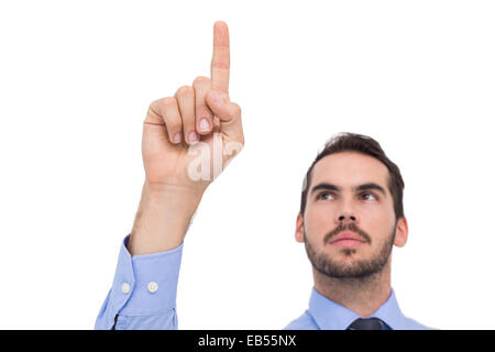 Businessman in shirt pointing something up Stock Photo