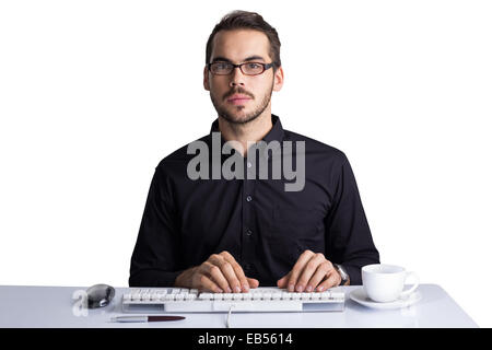 Focused businessman typing on keyboard Stock Photo