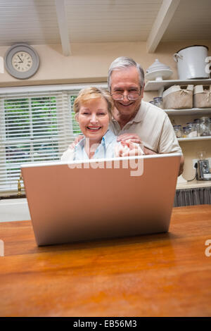 Senior couple using the laptop together Stock Photo