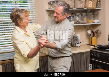 Romantic senior couple dancing together Stock Photo