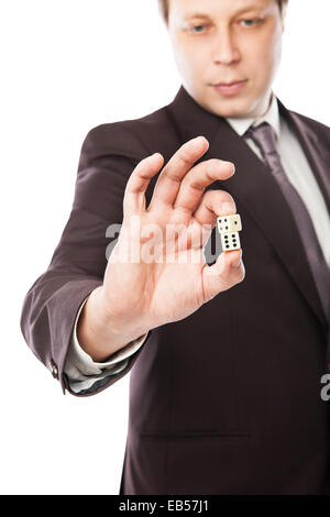 Business risk concept - businessman in suit throwing dices isolated on white background Stock Photo