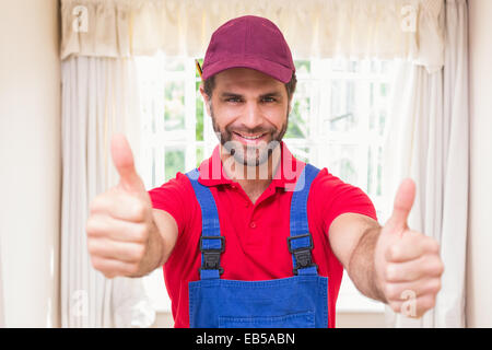 Construction worker showing thumbs up Stock Photo
