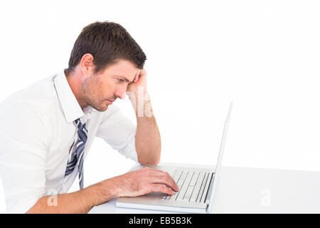 Focused businessman working on his laptop Stock Photo