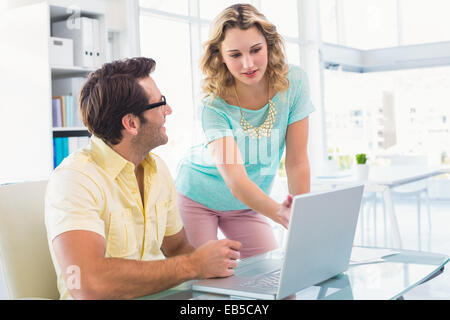 Creative team pointing something on computer screen Stock Photo