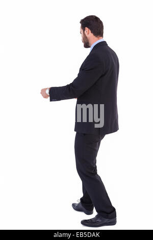 Handsome businessman in suit standing Stock Photo