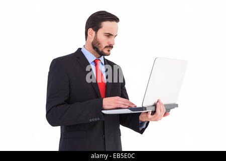 Focused businessman using his laptop Stock Photo