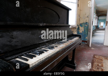 Old piano in Beelitz Heilstaetten former TB hospital, abandoned place near Berlin Stock Photo