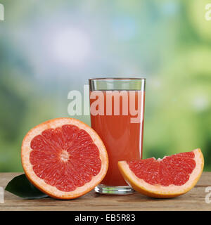 Healthy grapefruit juice and fresh grapefruits fruits in summer Stock Photo