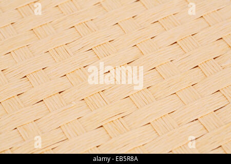 Rattan place mat texture for background, close-up image. Stock Photo