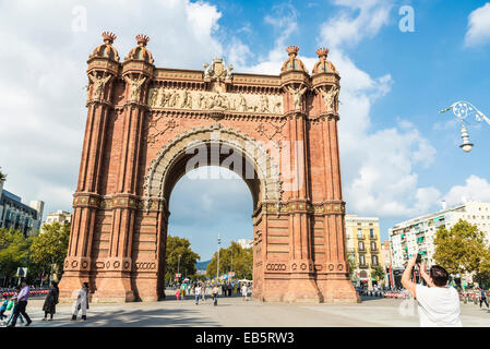 Panoramic view of Arc de Triomf Barcelona with people walking around. Stock Photo