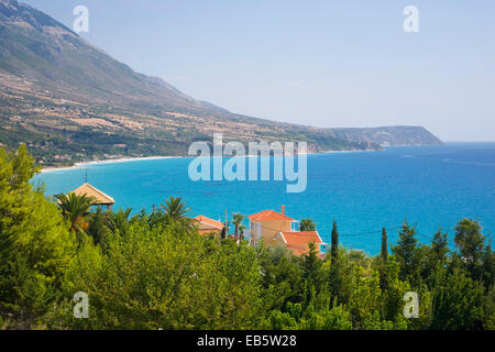Lourdata, Kefalonia, Ionian Islands, Greece. View across the turquoise waters of Lourdata Bay, Lourdas Beach prominent.