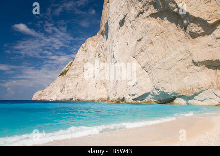 Anafonitria, Zakynthos, Ionian Islands, Greece. Sheer limestone cliffs towering above the turquoise waters off Navagio Beach. Stock Photo