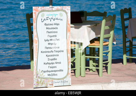 Vathy, Ithaca, Ionian Islands, Greece. Taverna menu board advertising a choice of typical Greek specialities. Stock Photo