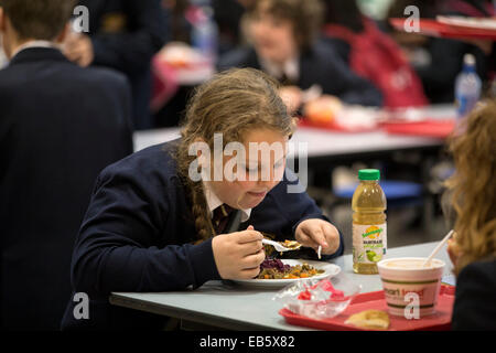 A pupil at Loreto High School in Chorlton, south Manchester eating school dinners cooked by top chefs. Stock Photo