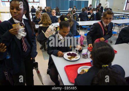 Pupils at Loreto High School in Chorlton, south Manchester eating school dinners cooked by top chefs. Stock Photo