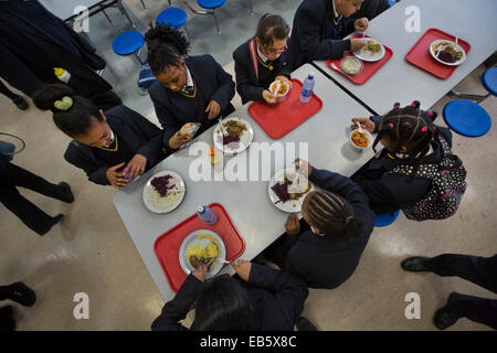 Pupils at Loreto High School in Chorlton, south Manchester eating school dinners cooked by top chefs. Stock Photo