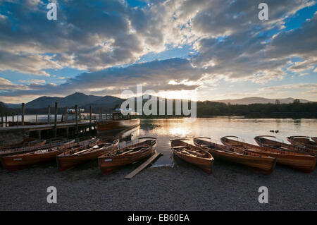 Landing Stage on Derwent Water with moored Derwent Water Launch and pleasure rowing boats. Stock Photo