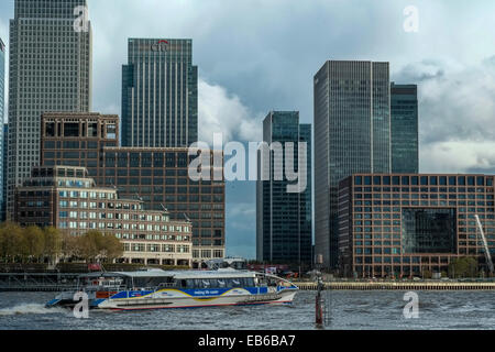 Late afternoon shot of Canary Wharf taken from the south side of the River Thames in Rotherhithe. Stock Photo