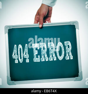 hand holding a chalkboard with the message 404 error written in it Stock Photo