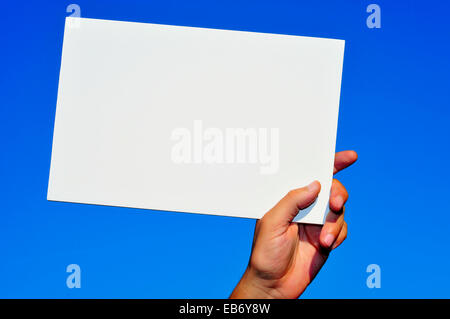 Better Life Sign on white paper. Man Hand Holding Paper with text. Isolated  on sky background Stock Photo - Alamy