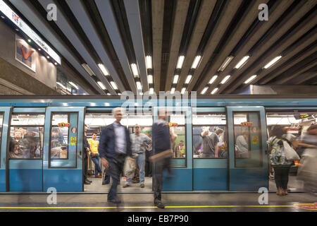 Santiago de Chile commuters leaving and entering Metro train in subway station during rush hour. Stock Photo