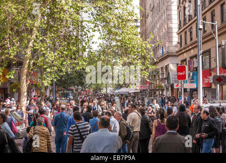 Santiago Chile, Paseo Ahumada. Crowds of people, shoppers, walking talking in the main shopping street of Santiago de Chile. Stock Photo